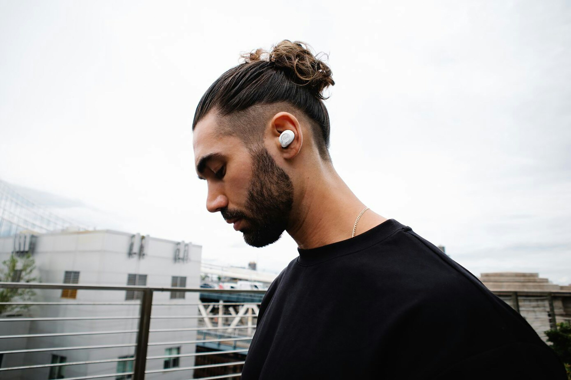 Klipsch T5 II best wireless headphones man on dock